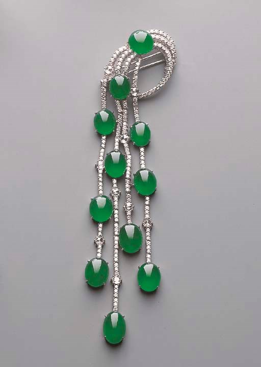 A JADEITE AND DIAMOND PENDANT/CLIP BROOCH