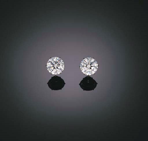 A MAGNIFICENT PAIR OF DIAMOND EAR STUDS