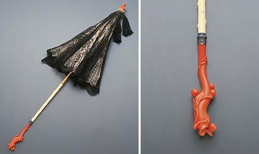 ** A VICTORIAN IVORY, CORAL AND LACE PARASOL