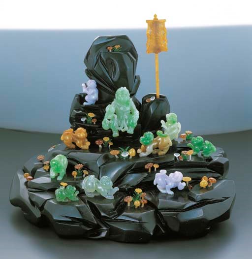 AN AMUSING GROUP OF JADEITE MONKEYS