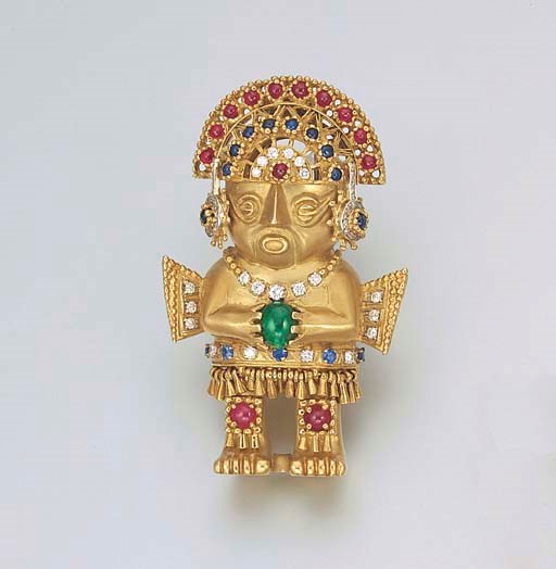 AN AZTEC STYLE 18K GOLD, DIAMOND AND MULTI-GEM FIGURINE CLIP BROOCH