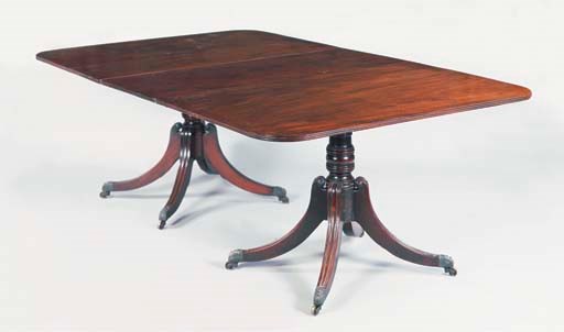 A MAHOGANY TWIN PEDESTAL DINING TABLE