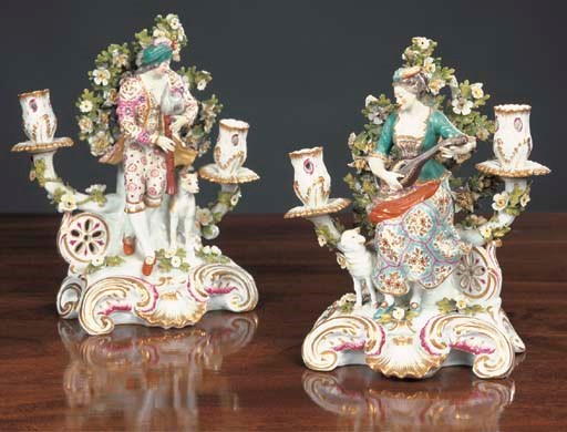 A pair of Samson candlestick figures of a shepherd and shepherdess