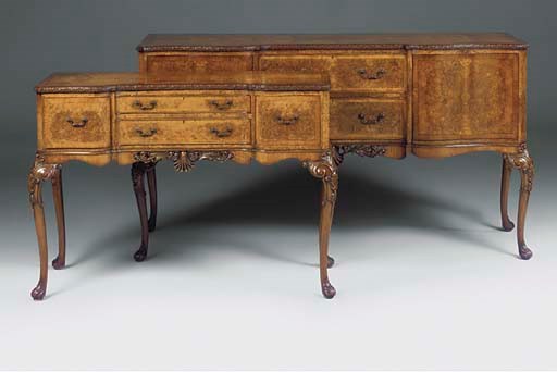 A BURR WALNUT AND WALNUT SERPENTINE SIDEBOARD
