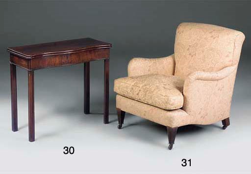 A HOWARD STYLE EASY ARMCHAIR