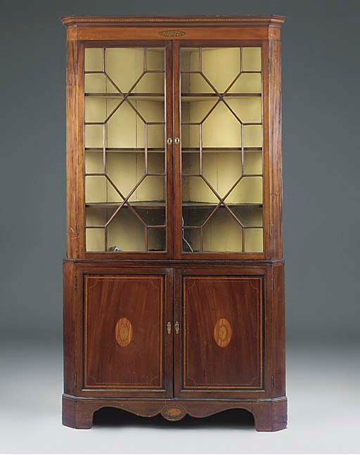 A MAHOGANY FRUITWOOD AND MARQUETRY CORNER CUPBOARD