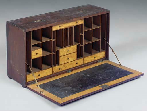 A MAHOGANY CAMPAIGN WRITING CABINET