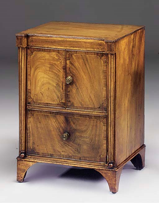 A mahogany and crossbanded bedside cupboard