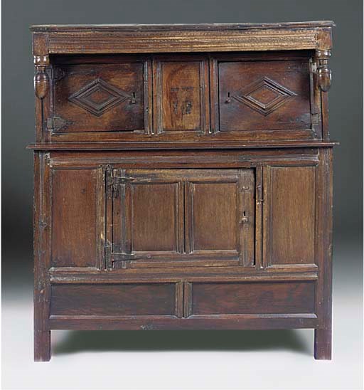 An English oak court cupboard