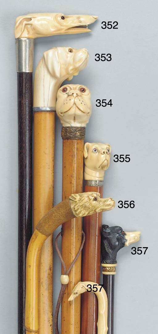 A carved ivory mounted malacca walking stick