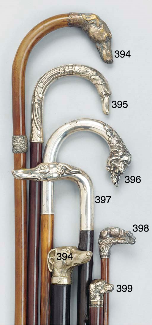 A silver mounted coconut wood walking stick