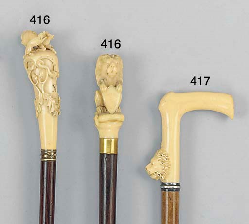 An ivory and white metal mounted malacca walking stick