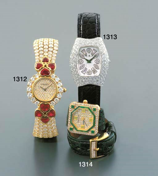 GRAFF. AN UNUSUAL LADY'S 18K WHITE GOLD AND DIAMOND-SET TONNEAU-SHAPED WRISTWATCH