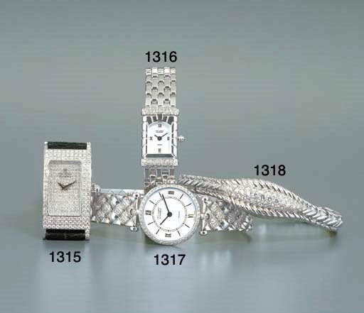 THE ROYAL DIAMOND. A LADY'S 18K WHITE GOLD AND DIAMOND-SET RECTANGULAR WRISTWATCH