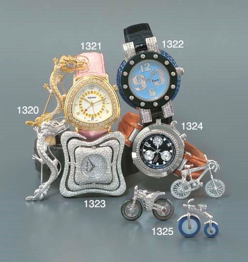 KUTCHINSKY. A SILVER, RUBBER, DIAMOND AND SAPPHIRE-SET WRISTWATCH WITH MOTHER-OF-PEARL DIAL