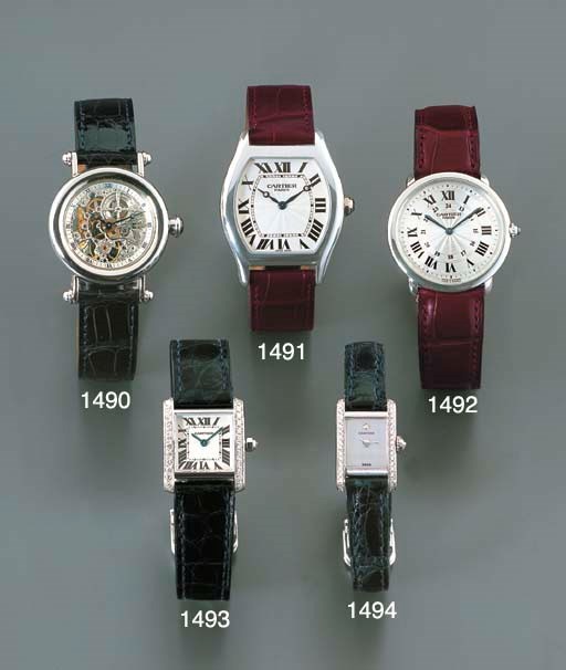 CARTIER. A FINE PLATINUM WRISTWATCH