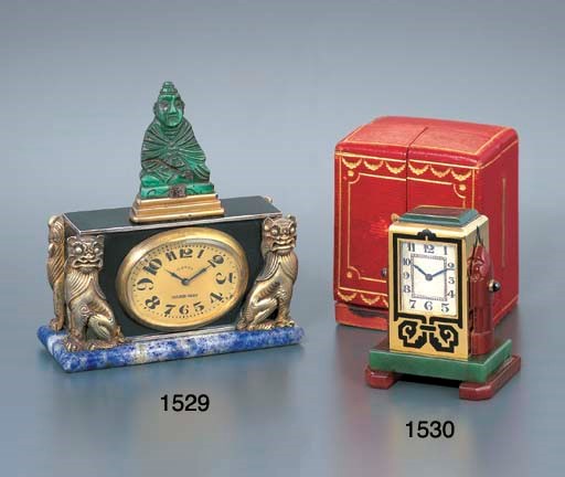 LACLOCHE FRERES. AN ART DECO SILVER, GILT METAL, ENAMEL, MALACHITE AND LAPIS LAZULI EIGHT DAY TIMEPIECE