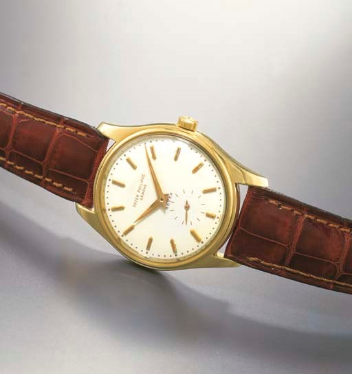 PATEK PHILIPPE. A FINE 18K GOLD SELF-WINDING WATER-RESISTANT WRISTWATCH WITH ENAMEL DIAL