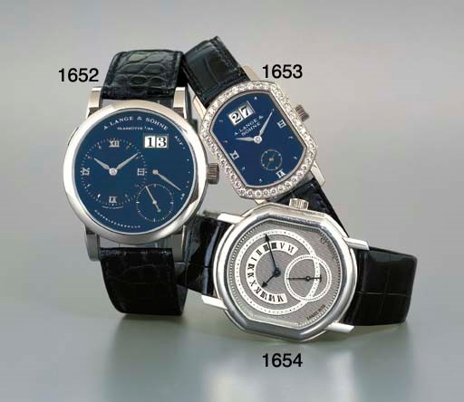 DANIEL ROTH. A FINE PLATINUM BARREL-SHAPED RETROGRADE WRISTWATCH