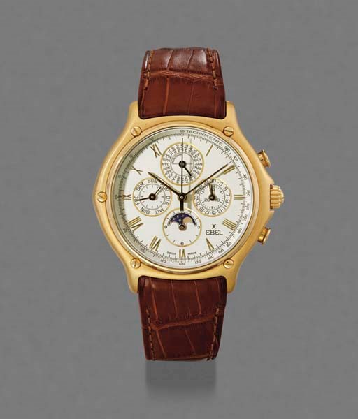 Ebel. An 18K gold tonneau-shaped self-winding perpetual calendar chronograph wristwatch with phases of the moon