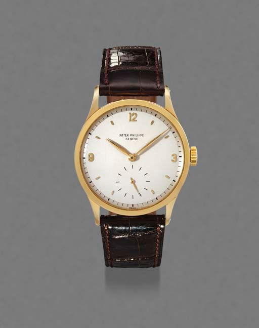 Patek Philippe. A fine and large 18K gold wristwatch with two-tone dial
