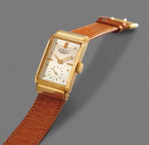 Patek Philippe. A fine and rare 18K gold rectangular wristwatch with hooded lugs