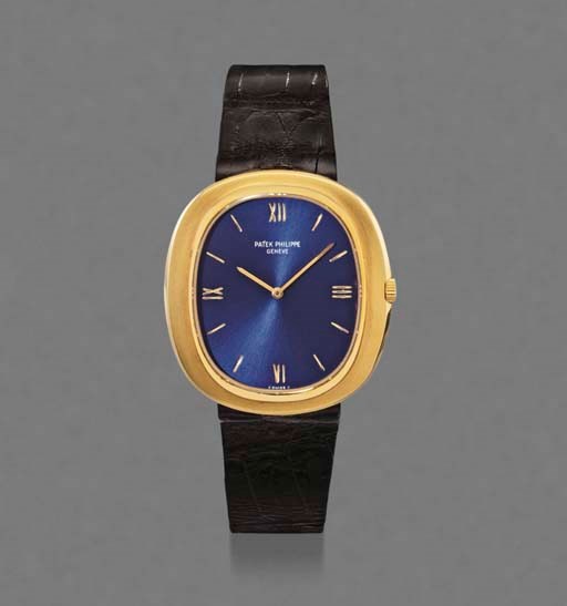 Patek Philippe. An 18K gold oval extra plat self-winding wristwatch