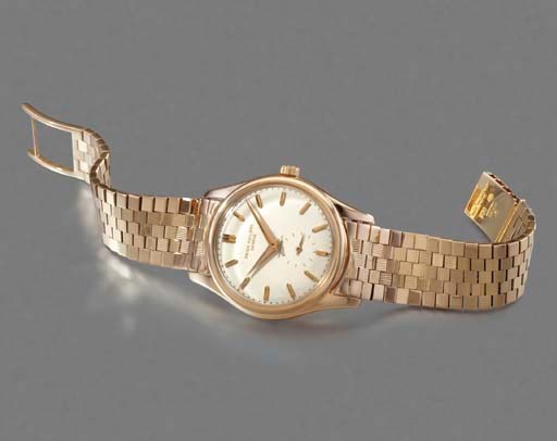 Patek Philippe. A fine and rare 18K pink gold self-winding waterproof wristwatch with enamel dial and bracelet