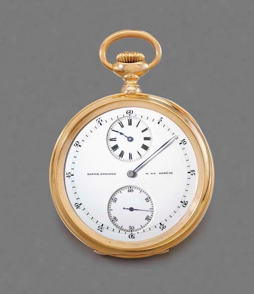 Patek Philippe. A rare 18K gold openface keyless lever watch with regulator dial