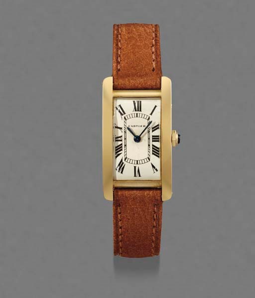 Cartier. A fine 18K gold rectangular curved wristwatch