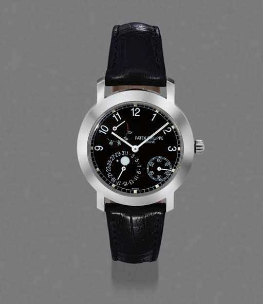 Patek Philippe. An 18K white gold self-winding waterproof wristwatch with power reserve, date and phases of the moon