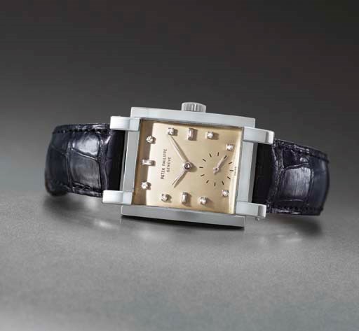 Patek Philippe. A very fine and rare platinum rectangular wristwatch with diamond-set numerals