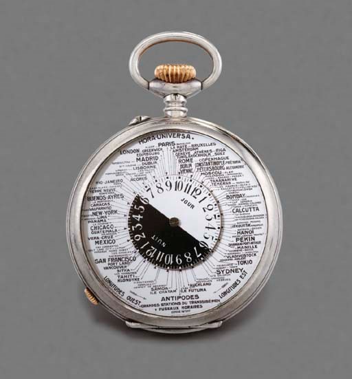 Swiss. An unusual silver double dial World Time keyless lever watch