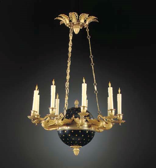 A CHARLES X ORMOLU AND BLACK AND GILT-TÔLE NINE LIGHT CHANDELIER