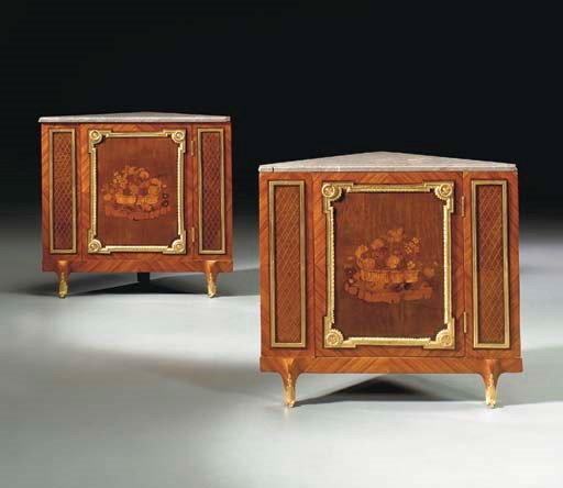A PAIR OF LOUIS XVI ORMOLU-MOUNTED TULIPWOOD, SYCAMORE, MARQUETRY AND PARQUETRY ENCOIGNURES