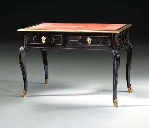 A REGENCE BRASS-INLAID EBONIZED BUREAU PLAT