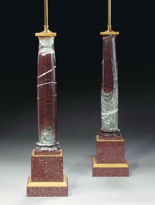 A PAIR OF ORMOLU-MOUNTED PORPHYRY AND CAMPAN MARBLE LAMPS