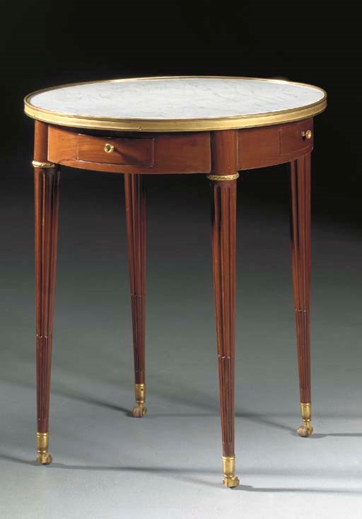 A LATE LOUIS XVI ORMOLU-MOUNTED MAHOGANY GUERIDON