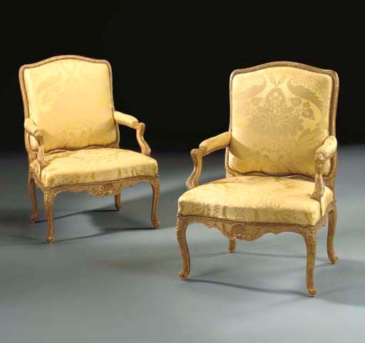 A PAIR OF EARLY LOUIS XV GILTWOOD FAUTEUILS