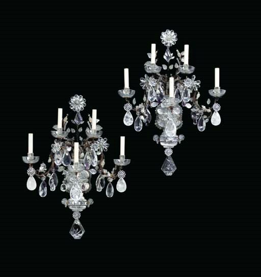 A PAIR OF FRENCH CUT-AND-MOLDED-COLORLESS-AND-AMETHYST-GLASS AND ROCK CRYSTAL FIVE-BRANCH WALL-LIGHTS