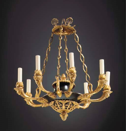 A CHARLES X ORMOLU AND PATINATED BRONZE EIGHT-LIGHT CHANDELIER
