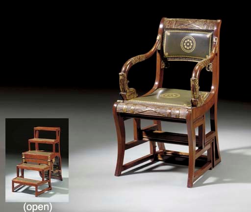 AN EMPIRE MAHOGANY AND PARCEL-GILT METAMORPHIC LIBRARY ARMCHAIR