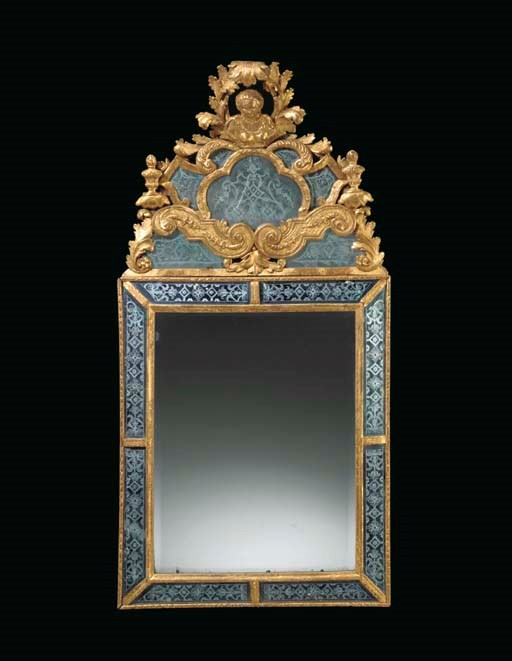 A SWEDISH GILTWOOD AND ETCHED GLASS MIRROR