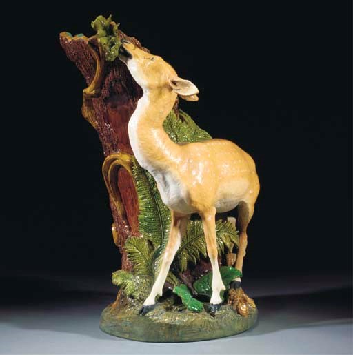 A Minton majolica stick-stand modelled as a faun