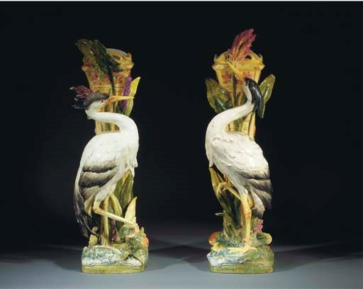 A pair of Royal Dux faience stick-stands modelled as cranes