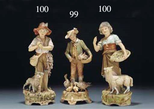 A Royal Dux figure of a youth and a Continental porcelain figure of a cockerel