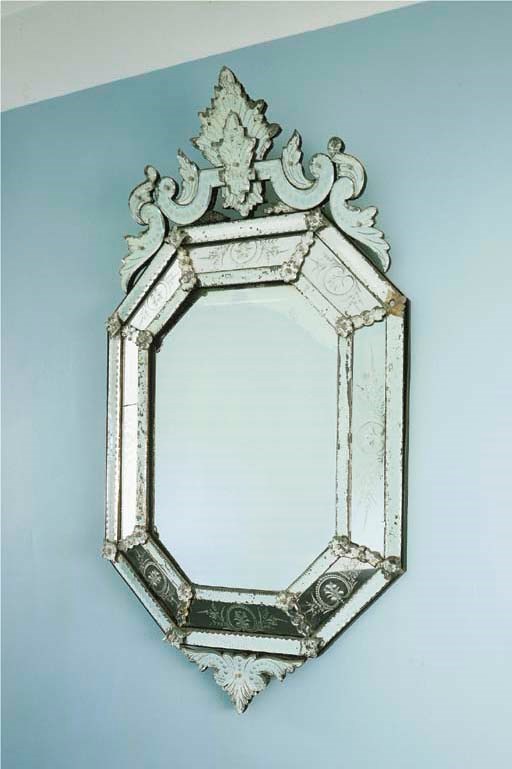 AN ITALIAN ETCHED-GLASS MIRROR