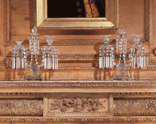 A PAIR OF LATE VICTORIAN CUT-GLASS AND GILT-METAL TWO-LIGHT CANDELABRA