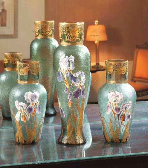 A MONT NOYE IRIDESCENT GREEN GLASS AND OVERPAINTED THREE-PIECE GLASS VASE GARNITURE