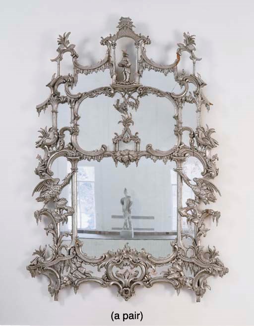 A PAIR OF GEORGE III STYLE SILVERED MIRRORS